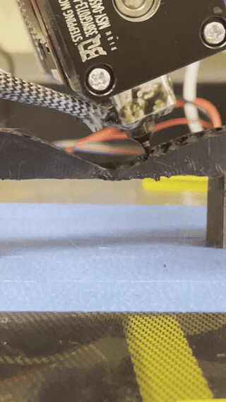 Core R Theta nozzle printing across a bridge
