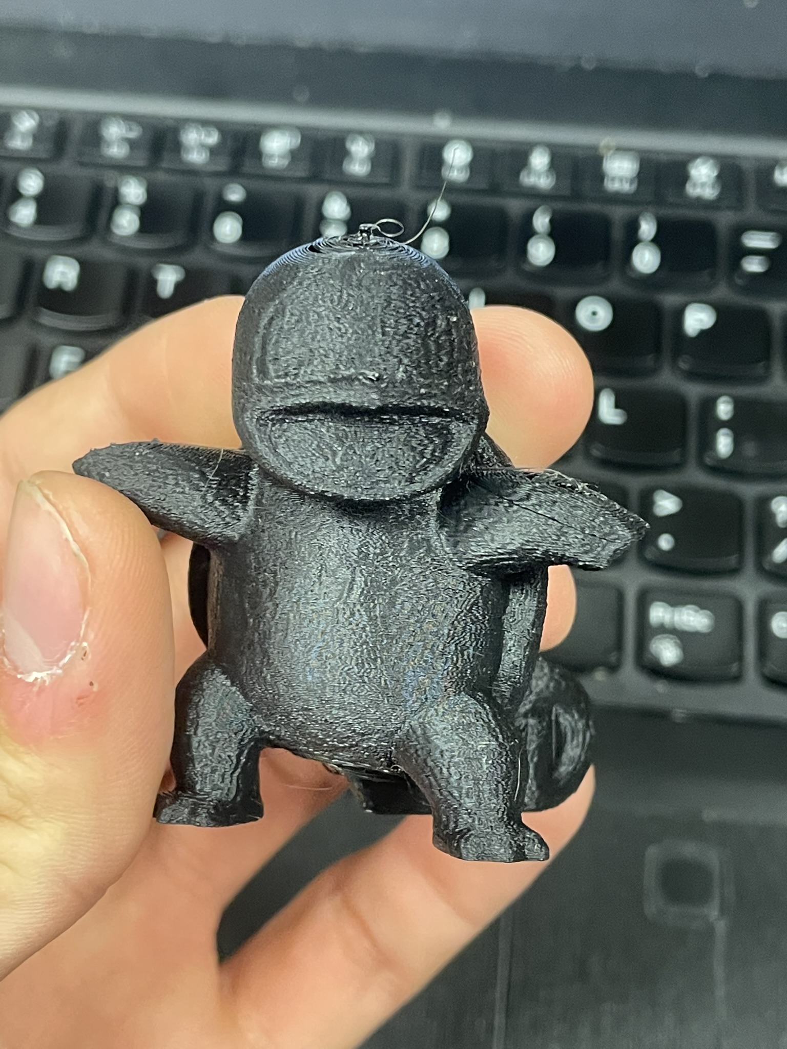 Small finished character print held in a hand