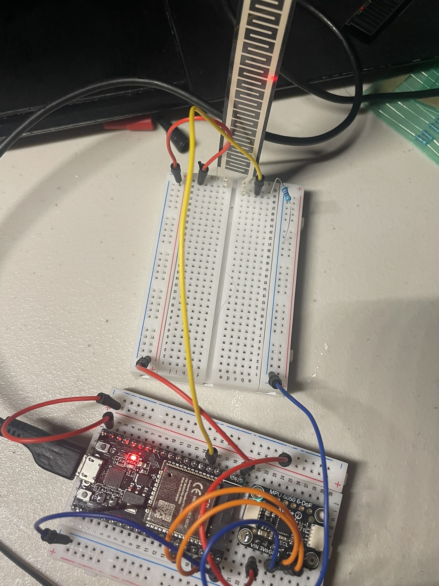 Flex sensor voltage-divider prototype on a breadboard