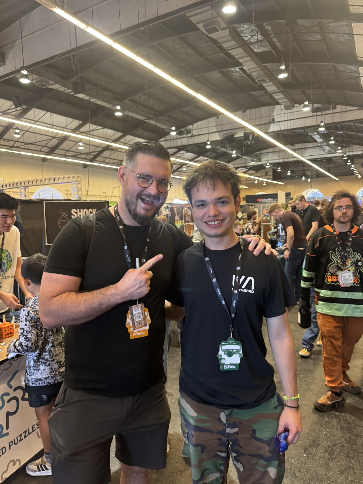 Jacob meeting another maker at an engineering event