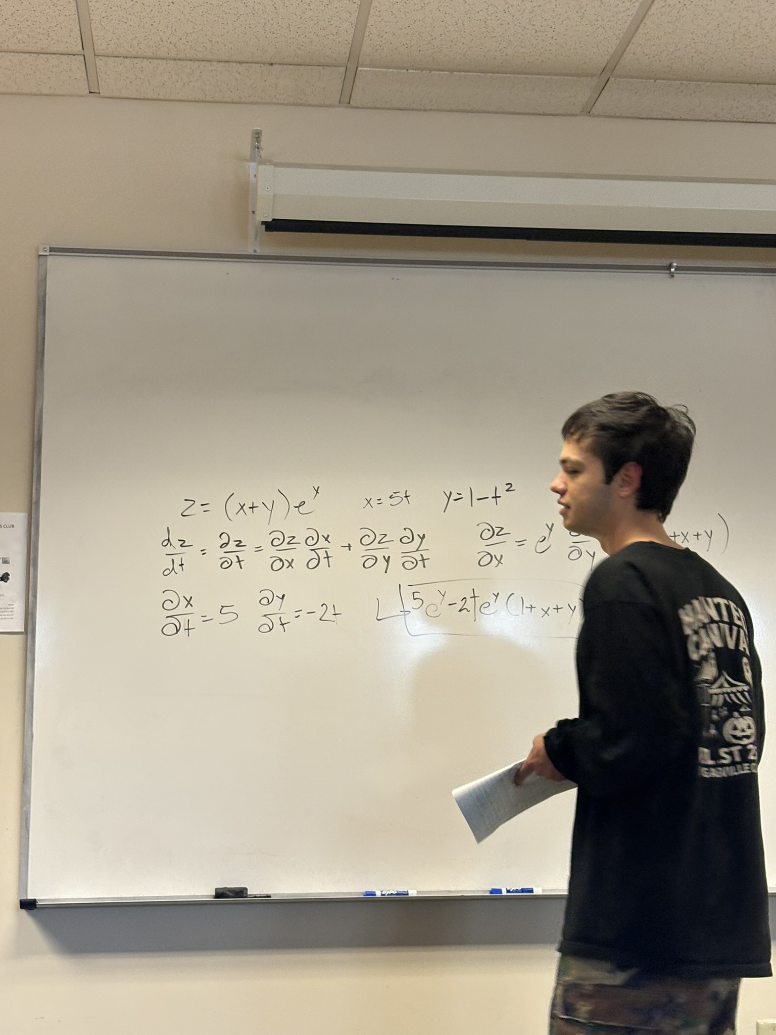 Jacob working through multivariable calculus at a whiteboard